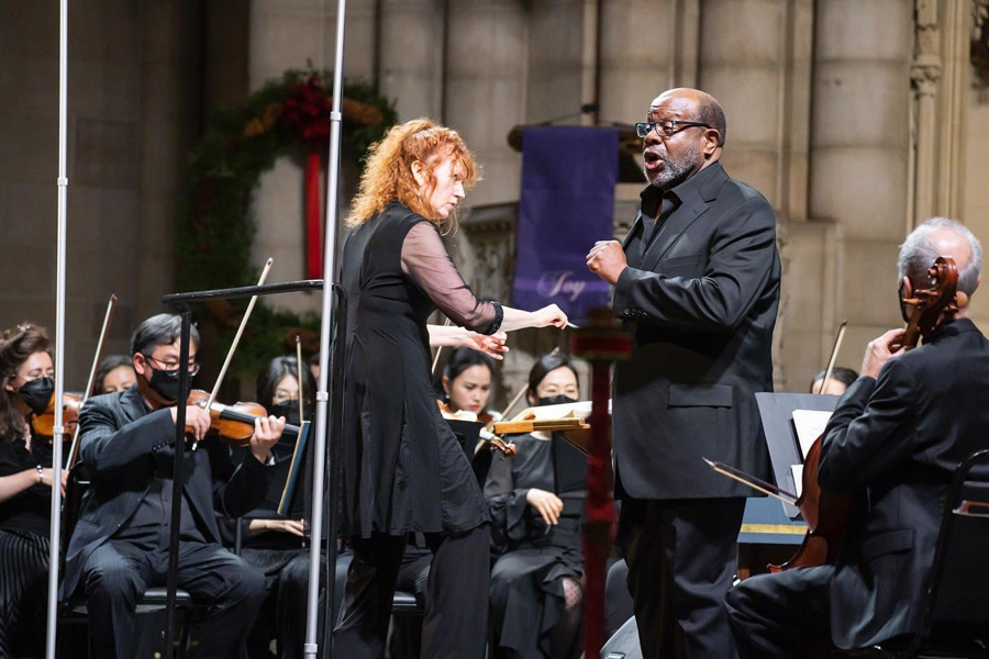 photo of Jeannette Sorrell conducting with bass-baritone Kevin Deas